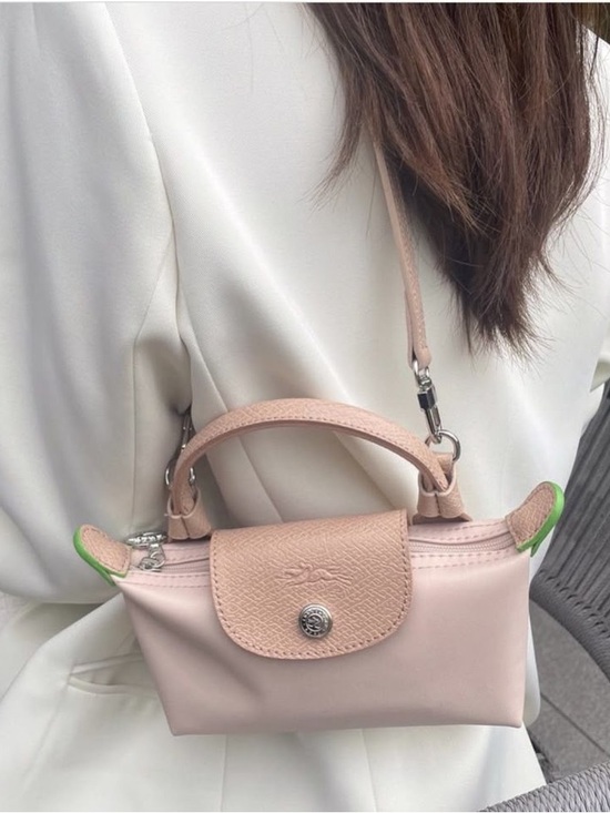 Longchamp Handbags - Longchamp Le Pliage Pouch, a pale pink nylon mini bag